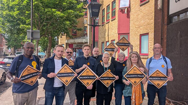 A group of Liberal Democrat campaigners in front of Walworth Police Station
